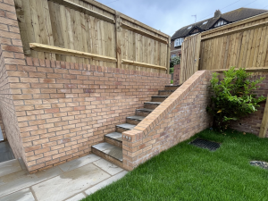 Brick wall and stairs.