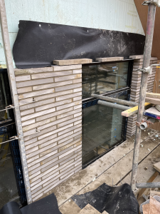 Construction brickwork with scaffolding.