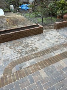 Brick patio back garden.