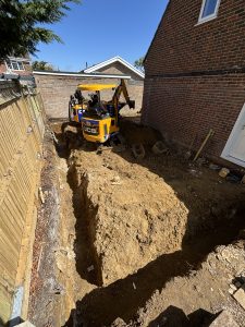 Building foundations in the back garden.
