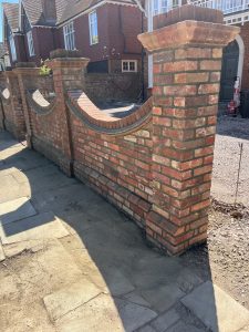 Repointing wall.
