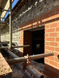 Construction brickwork with scaffolding.